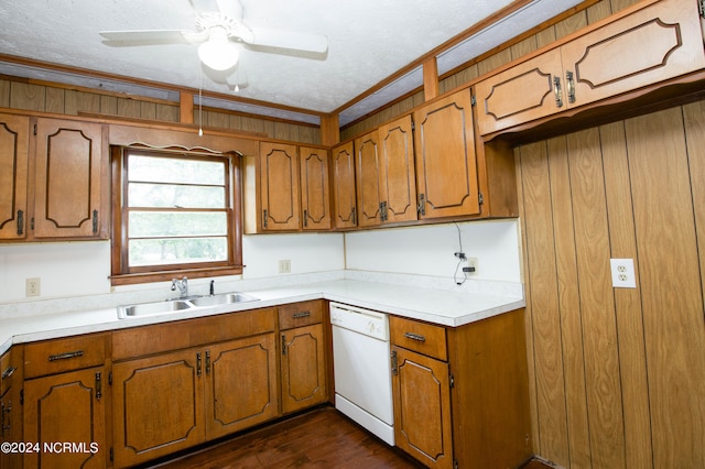 kitchen with a textured ceiling, dark hardwood / wood-style flooring, white dishwasher, sink, and ceiling fan