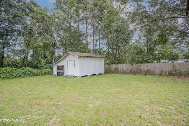 view of yard with a storage unit