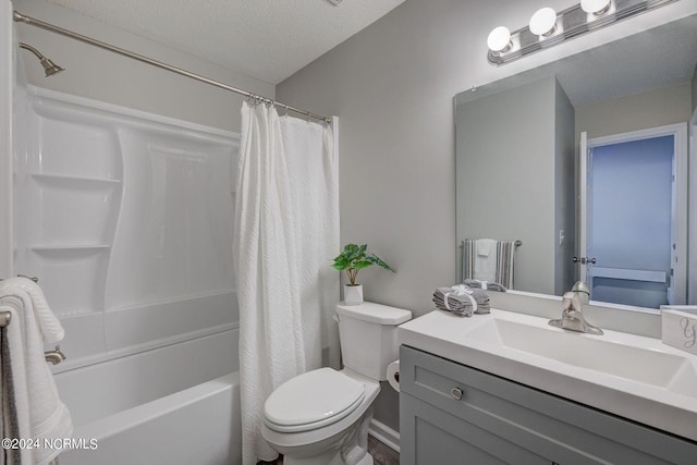 full bathroom with vanity, toilet, a textured ceiling, and shower / tub combo