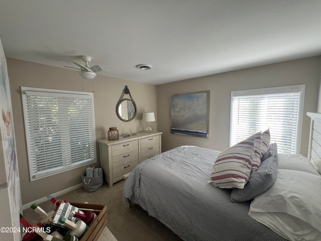 bedroom featuring ceiling fan and carpet floors