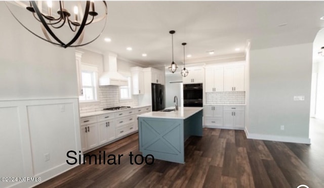 kitchen with light countertops, premium range hood, black appliances, and white cabinetry