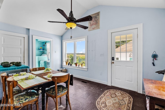 dining space with lofted ceiling, a healthy amount of sunlight, and visible vents