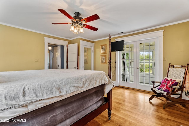 bedroom with ornamental molding, access to outside, french doors, and wood finished floors