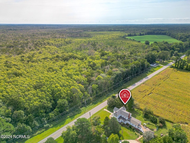 drone / aerial view with a view of trees