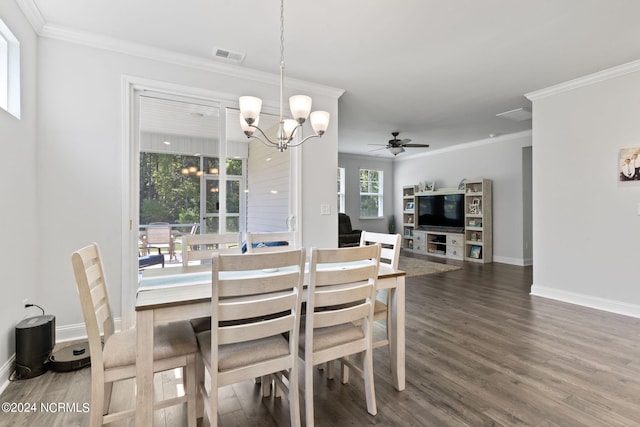 dining area featuring ceiling fan with notable chandelier, dark hardwood / wood-style flooring, and crown molding