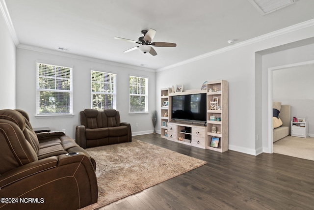 living room with crown molding, ceiling fan, and dark hardwood / wood-style floors