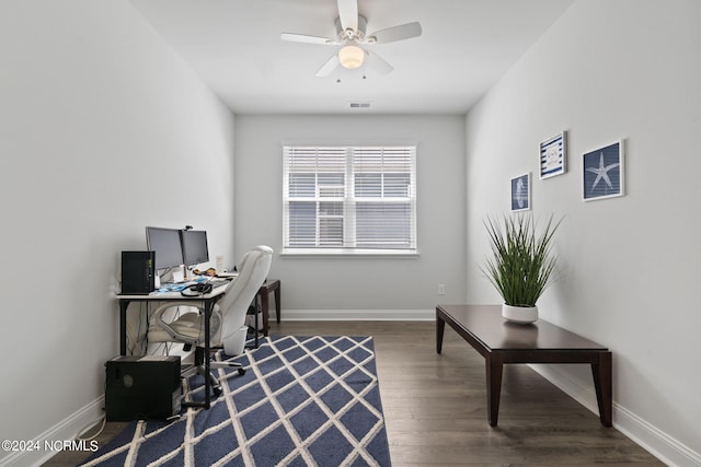 office space with dark hardwood / wood-style flooring and ceiling fan