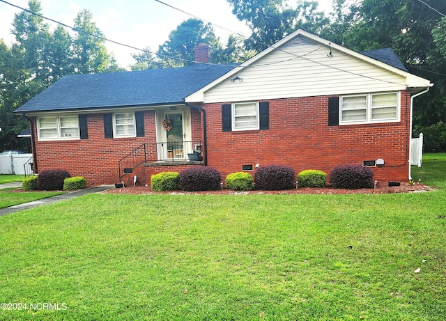 view of front of home with a front yard