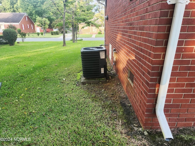 view of yard featuring central AC unit