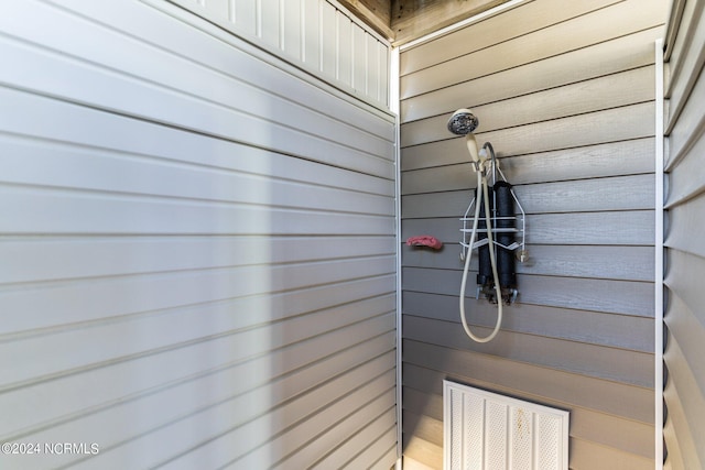 exterior details with a tile shower