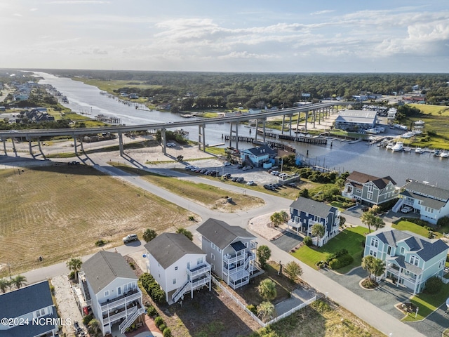 bird's eye view featuring a residential view and a water view