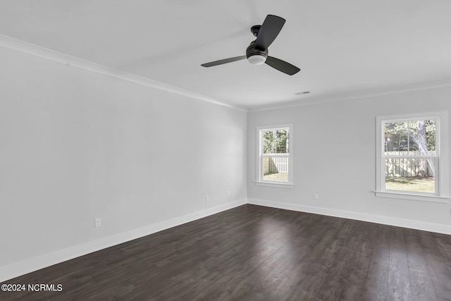 unfurnished room with dark wood-type flooring, ceiling fan, and crown molding