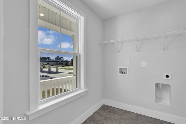 laundry room featuring hookup for a washing machine and electric dryer hookup