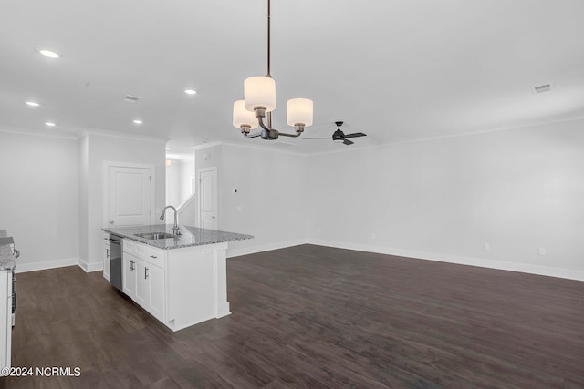 kitchen with a kitchen island with sink, pendant lighting, ceiling fan with notable chandelier, sink, and stainless steel dishwasher