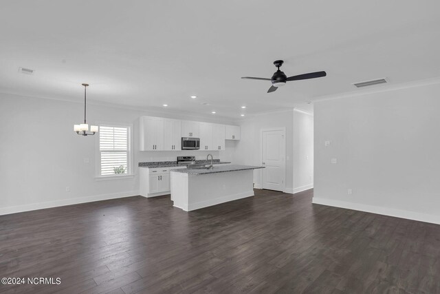 kitchen featuring ceiling fan with notable chandelier, appliances with stainless steel finishes, dark wood-type flooring, and white cabinetry