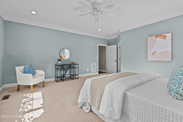 bedroom with crown molding, carpet, visible vents, and baseboards