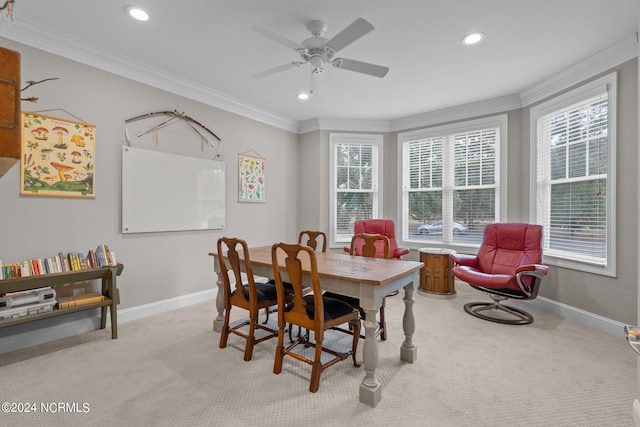 carpeted dining area with ornamental molding, recessed lighting, a ceiling fan, and baseboards