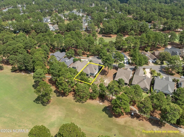 birds eye view of property with a residential view