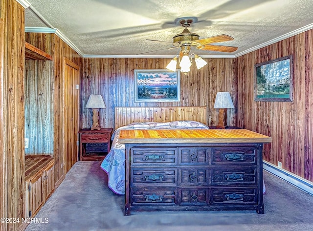 bedroom featuring carpet floors, wood walls, ornamental molding, and a textured ceiling