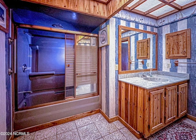 full bathroom featuring shower / bath combination, vanity, and baseboards