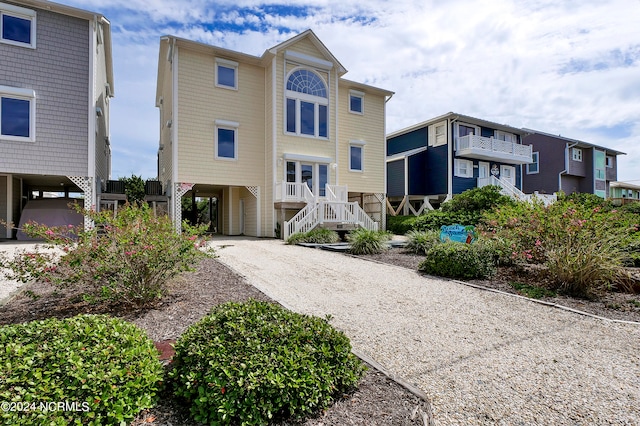 view of front of home with a carport