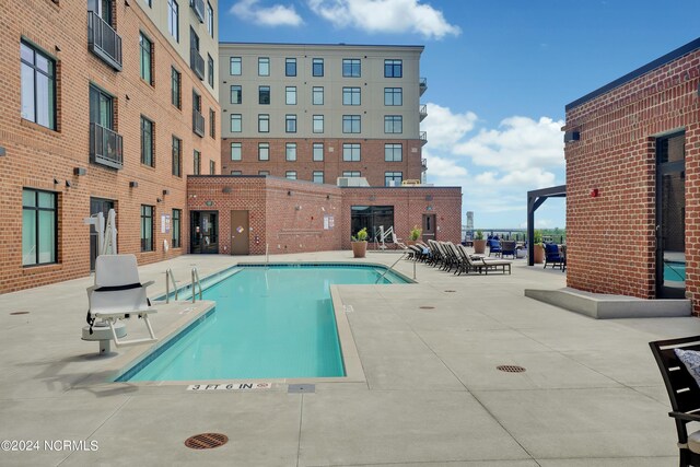 view of pool with a patio area