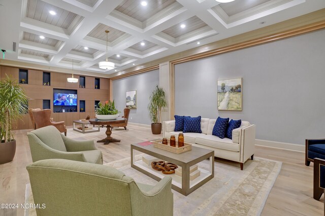 living room featuring beam ceiling, recessed lighting, light wood-style floors, and baseboards