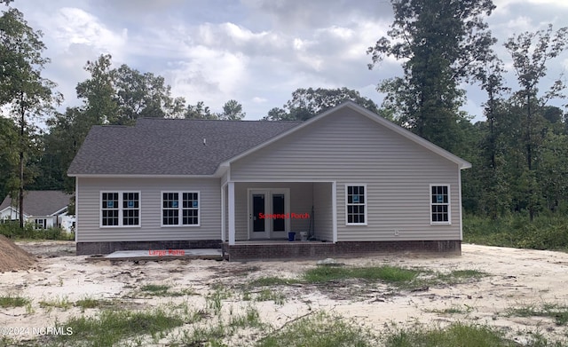 back of property with french doors