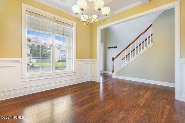 interior space with dark wood-type flooring, crown molding, and an inviting chandelier