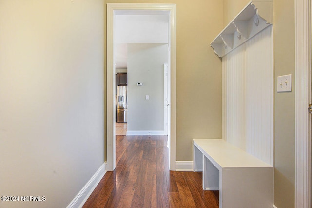 mudroom with dark wood-type flooring