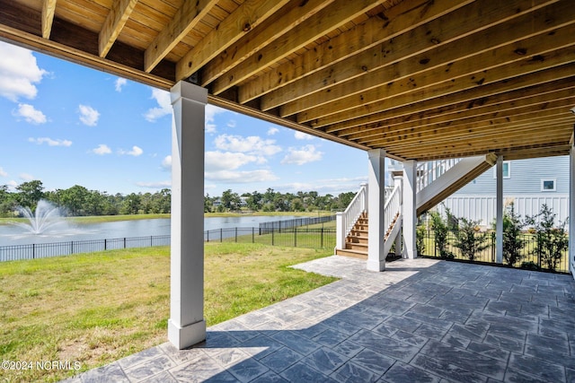 view of patio / terrace with a water view