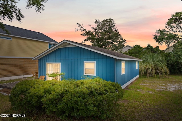 view of property exterior at dusk