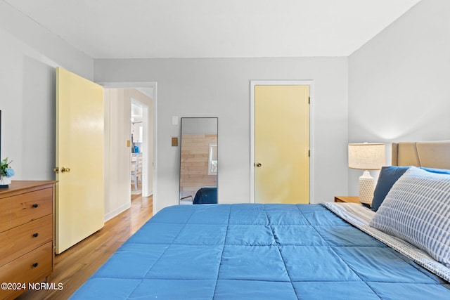 bedroom featuring hardwood / wood-style flooring