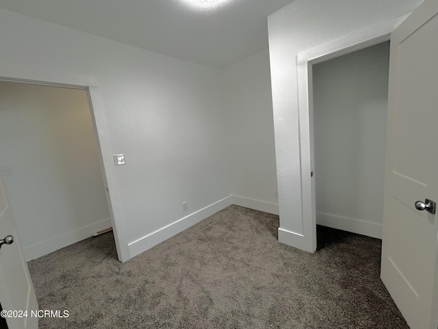 104 Charles St, Hertford, NC 27944 - unfurnished bedroom featuring carpet flooring and baseboards