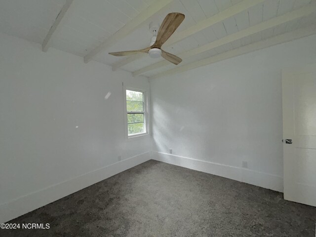 spare room featuring ceiling fan, beamed ceiling, and wooden ceiling