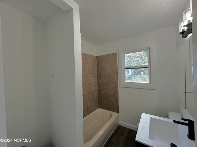 bathroom with vanity and hardwood / wood-style flooring