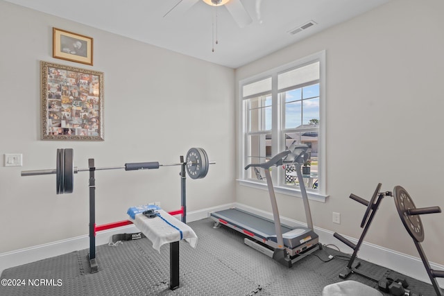 workout area with ceiling fan