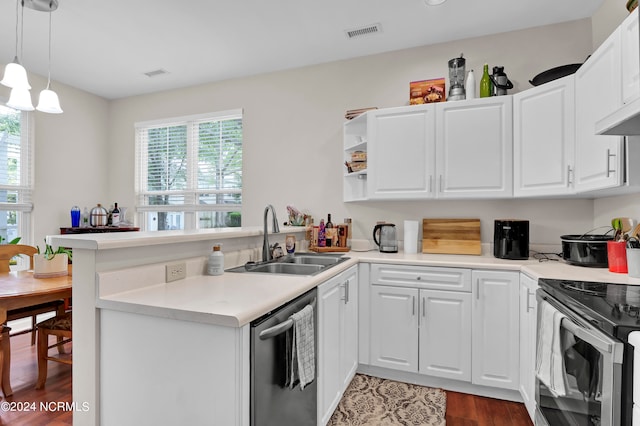 kitchen featuring white cabinets, kitchen peninsula, dishwasher, pendant lighting, and sink