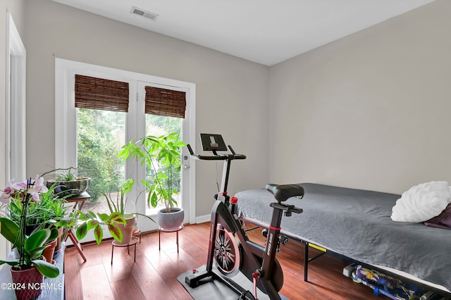 bedroom featuring hardwood / wood-style floors