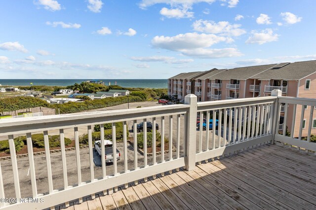 deck featuring a water view