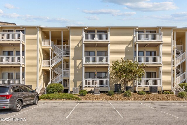 view of property with central AC