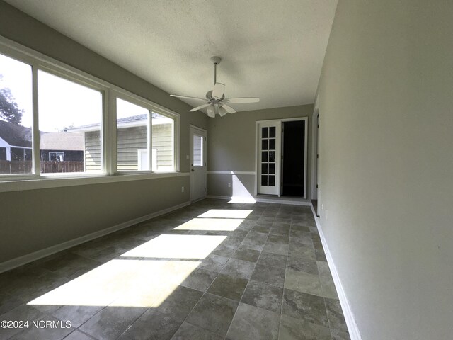 spare room featuring ceiling fan