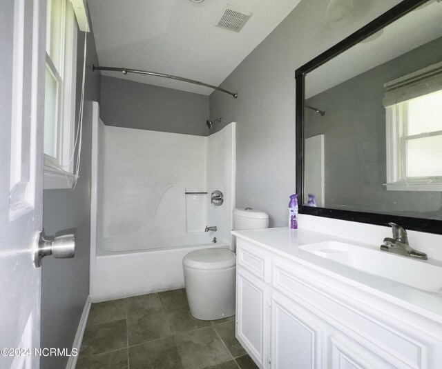 full bathroom featuring tile patterned flooring, vanity, toilet, and bathtub / shower combination