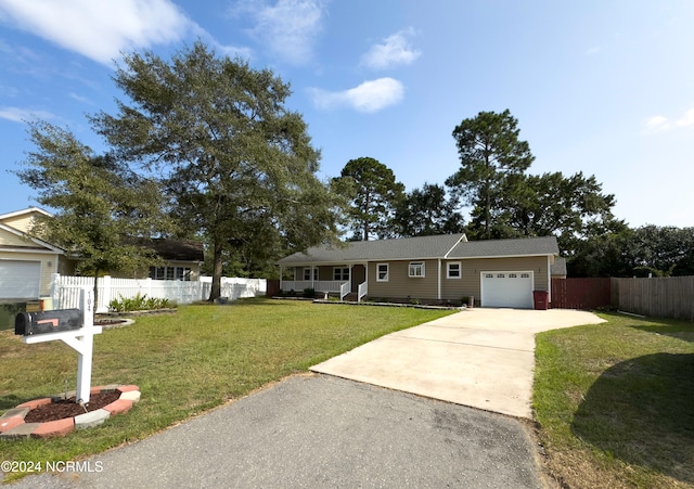 ranch-style house with a front yard and a garage