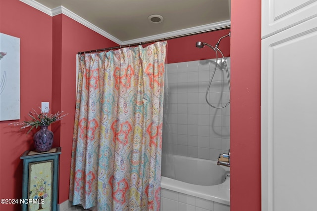 full bathroom with shower / tub combo with curtain and ornamental molding