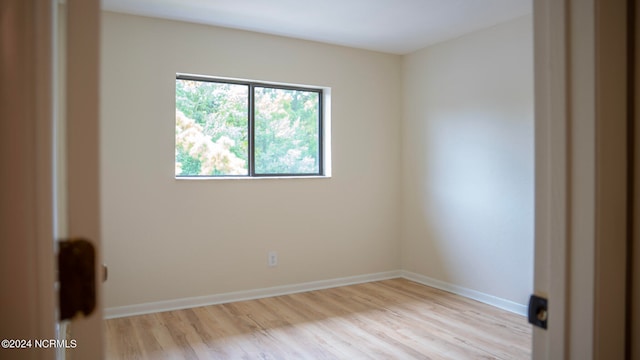 empty room featuring light hardwood / wood-style floors