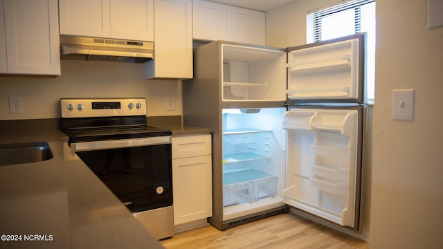 kitchen featuring stainless steel range with electric stovetop, under cabinet range hood, fridge, white cabinetry, and open shelves