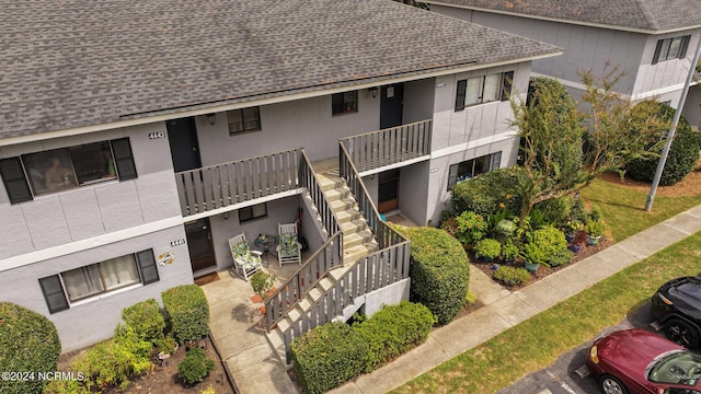 view of property with stairs