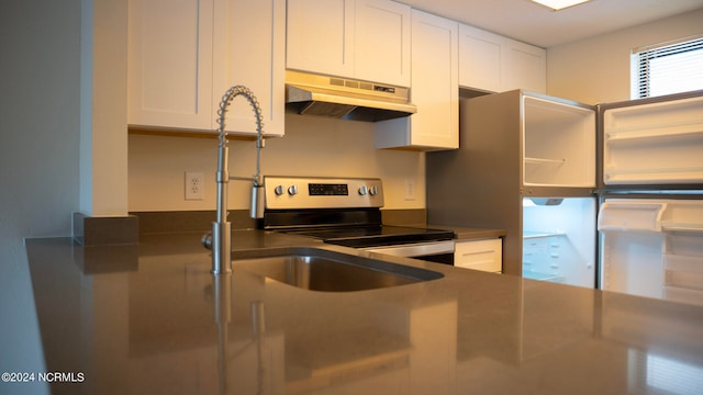 kitchen with sink, white cabinets, and stainless steel range with electric cooktop