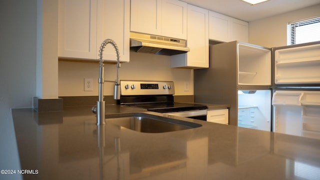 kitchen featuring electric range, white cabinets, dark countertops, under cabinet range hood, and open shelves